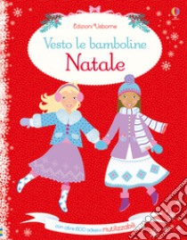 Vesto le bamboline per Natale. Con adesivi. Ediz. illustrata libro di Pratt Leonie; Baggott Stella