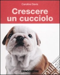 Crescere un cucciolo libro di Davis Caroline