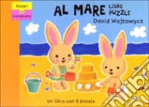 Allegri coniglietti al mare. Libro puzzle libro di Wojtowycz David