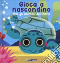 Gioca a nascondino con gli animali del mare. Dietro ai buchi. Ediz. a colori libro di Grassi Marcella