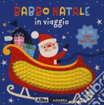 Babbo Natale in viaggio. Il tuo libro grattino. Ediz. a colori libro di Wade Sarah